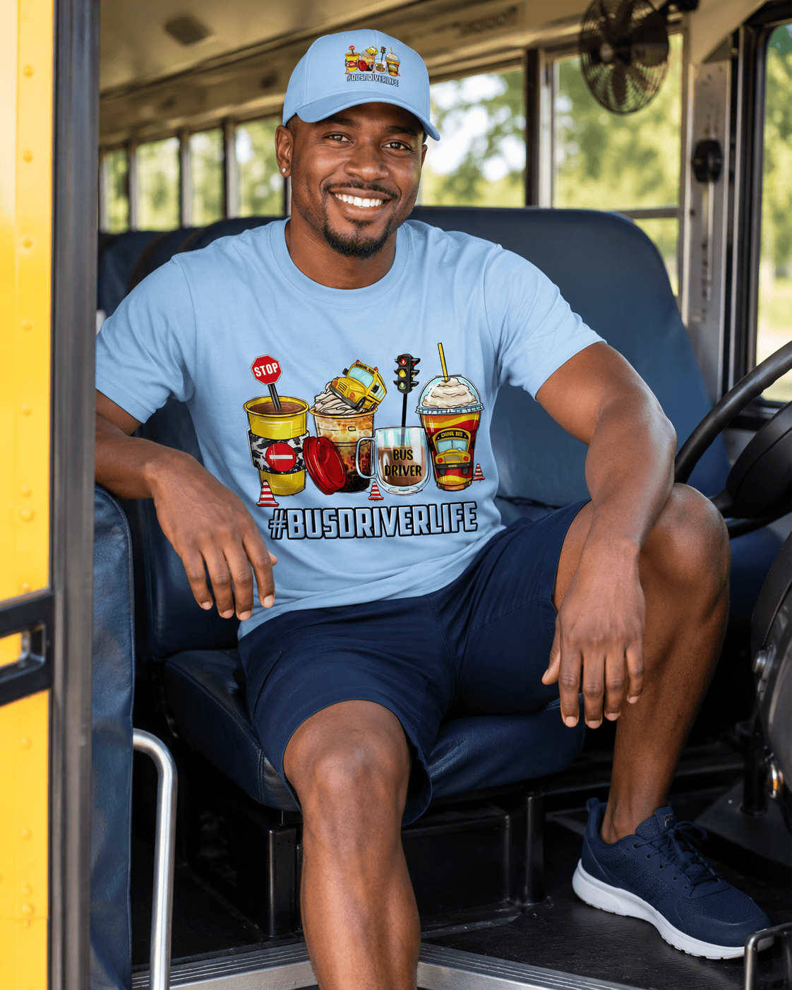 Graphic of a school bus and driver on a T-shirt by MK Eye Catching Eventful Creations LLC, celebrating bus driver life.