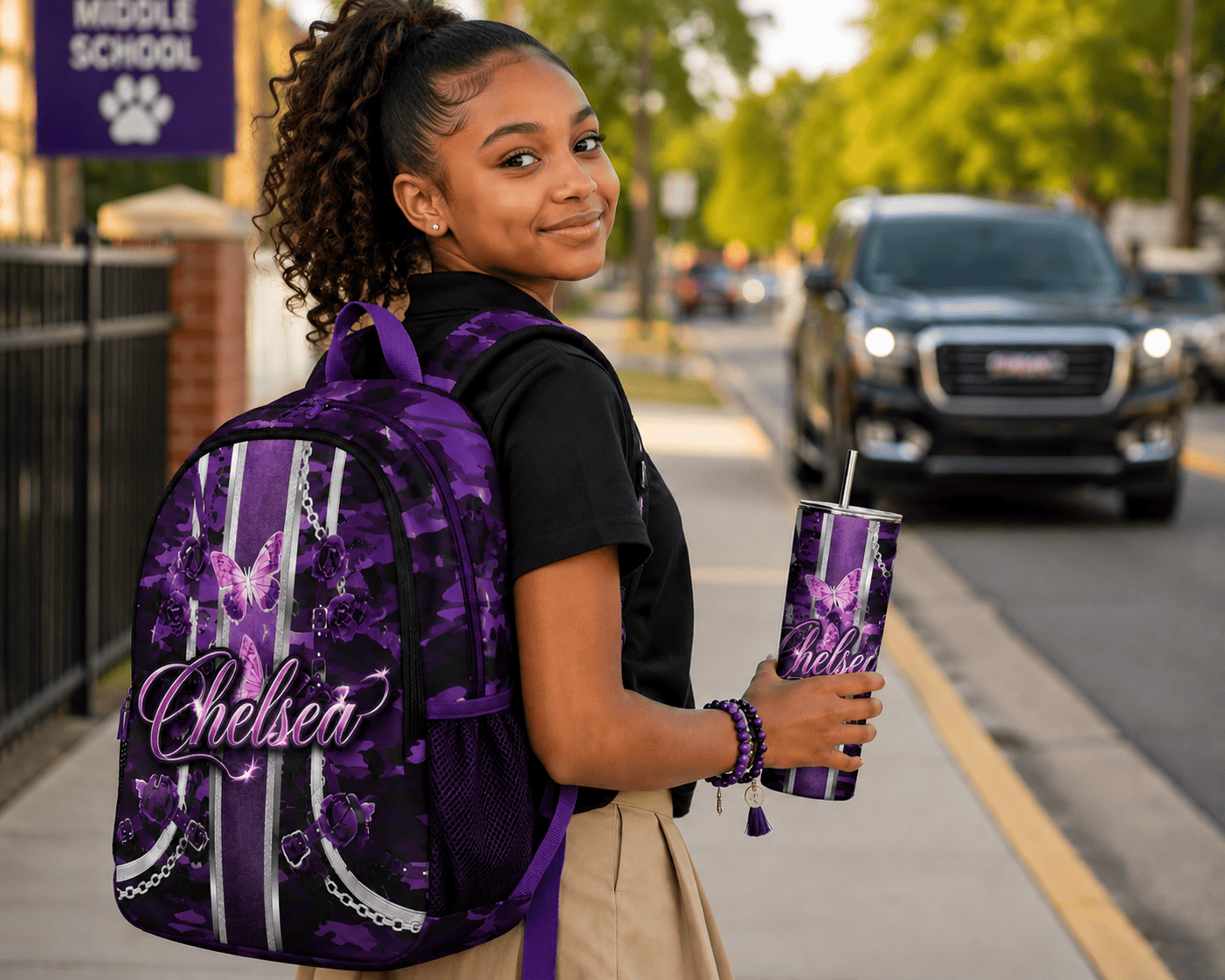 Personalized girls' backpack and matching tumbler set with purple butterfly design, custom name Chelsea in script font, back-to-school accessories for middle school students.